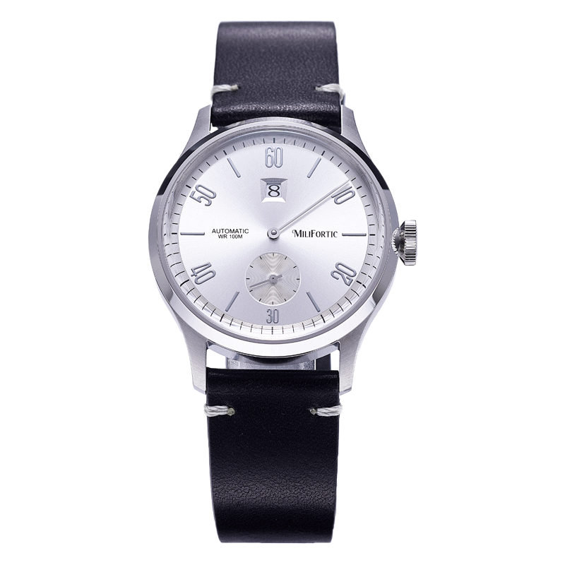 Official Milifortic R088 photograph with silver dial, jumping-hour window, central minute hand, small seconds and dark strap.